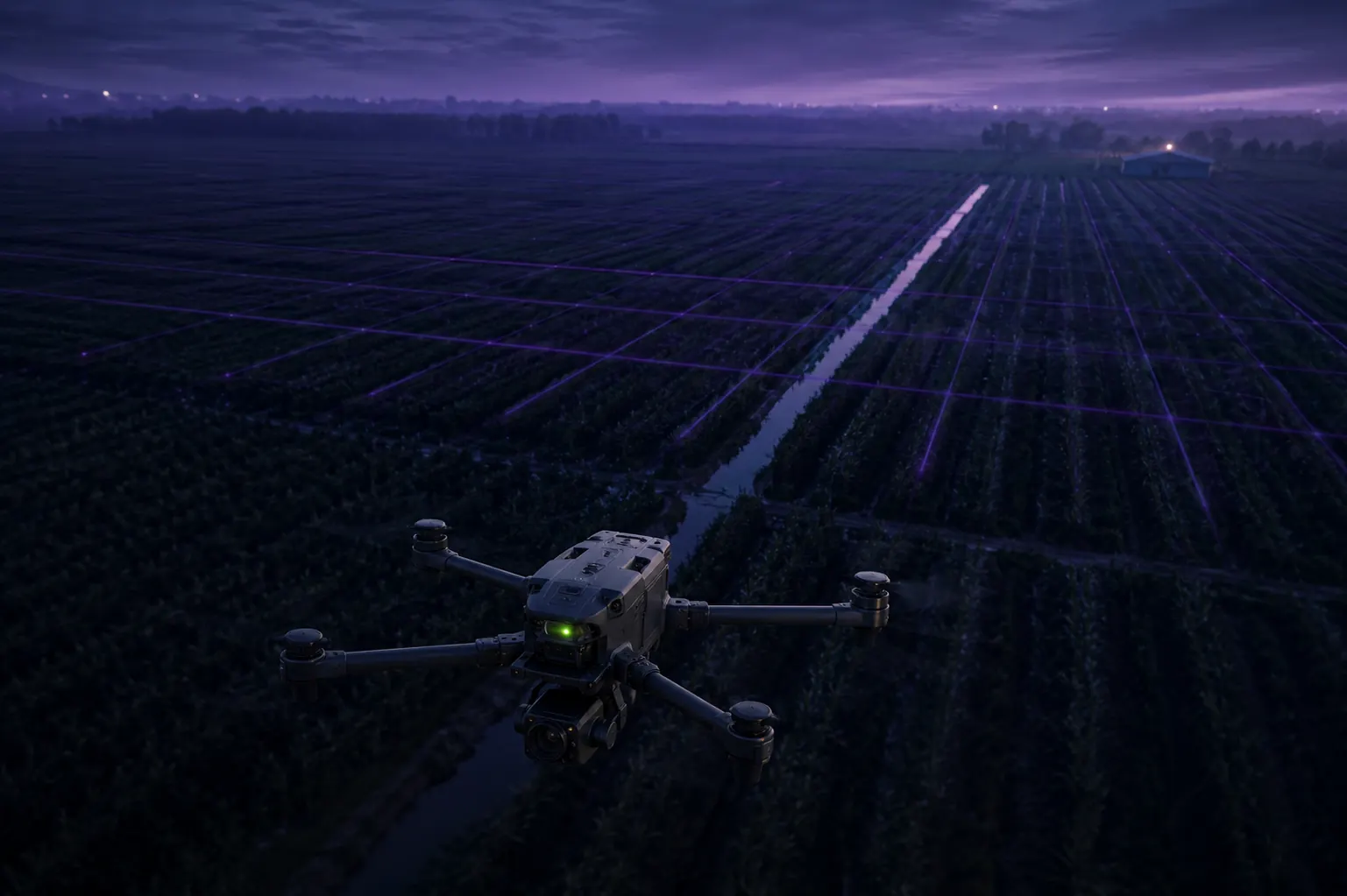 A survey drone flying low over irrigated crop rows at dusk